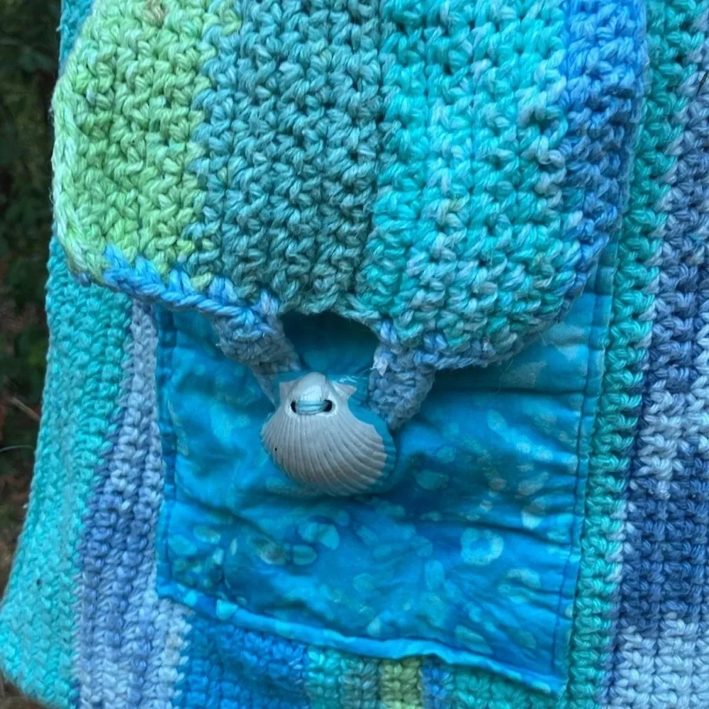Handmade crochet bag with shell pocket and batik beautiful colors